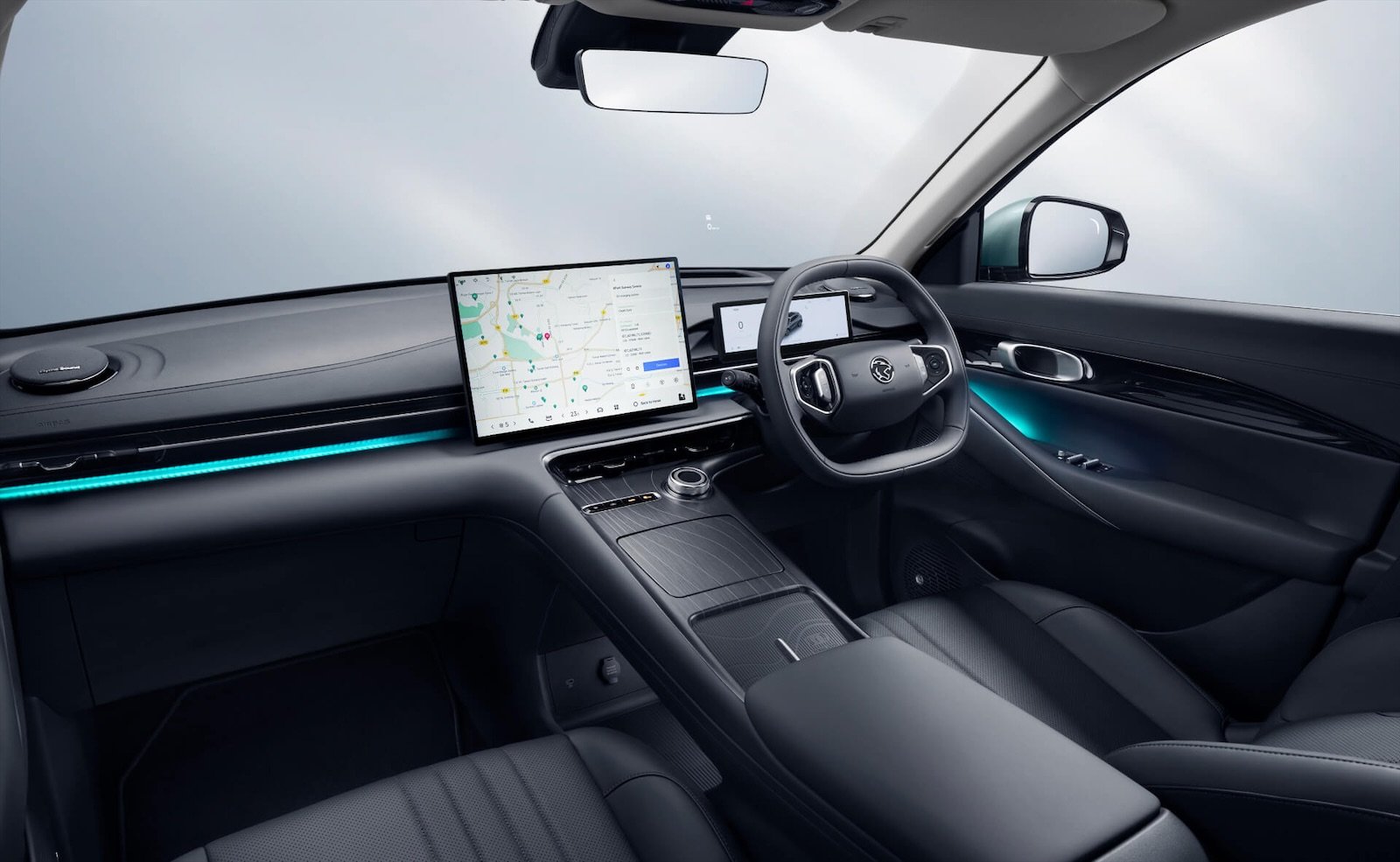 e.MAS 7 dashboard showing the 15.4-inch display with the integrated charging map